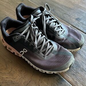 On Running Athletic Shoes in Black and Gray
